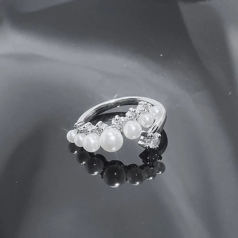 French gentle autumn and winter with open pearl ring