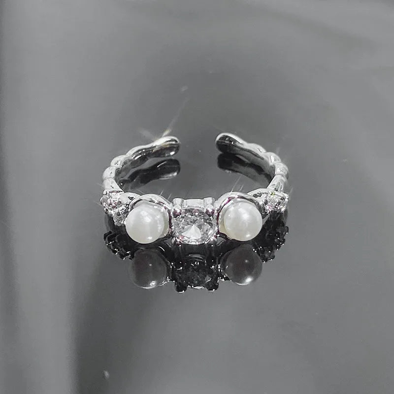 French gentle autumn and winter with open pearl ring